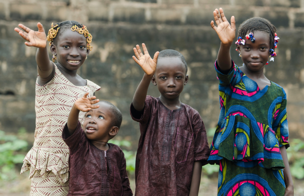 african kids waving hi